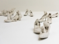 Untitled Accumulation, 1962-1963, 10 Paar Absatzschuhe, genähter und gefüllter Stoff und Farbe, Yayoi Kusama